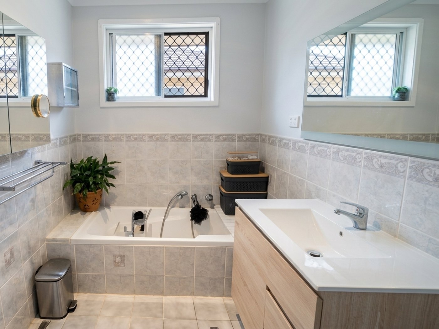 Renovated bathroom tiled by SLJ Express Tiling & Waterproofing